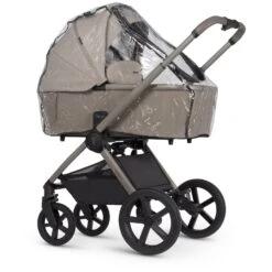 Venicci Venicci Upline 2 Travel System With Accessories, Tiago Car Seat & ISOFIX Base - Taupe -Push Chair Expert Sales Venicci Upline 2 Taupe Carrycot Raincover 1