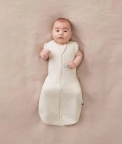 ErgoPouch ErgoPouch Organic All Year Swaddle Sleeping Bag | 1.0 Tog | 0-3 Months - Oatmeal -Push Chair Expert Sales cocoon 1.0t oatmeal armsout 1 1688x2000 2d9475ee 228d 426d a235 ce430bfe91b1 1